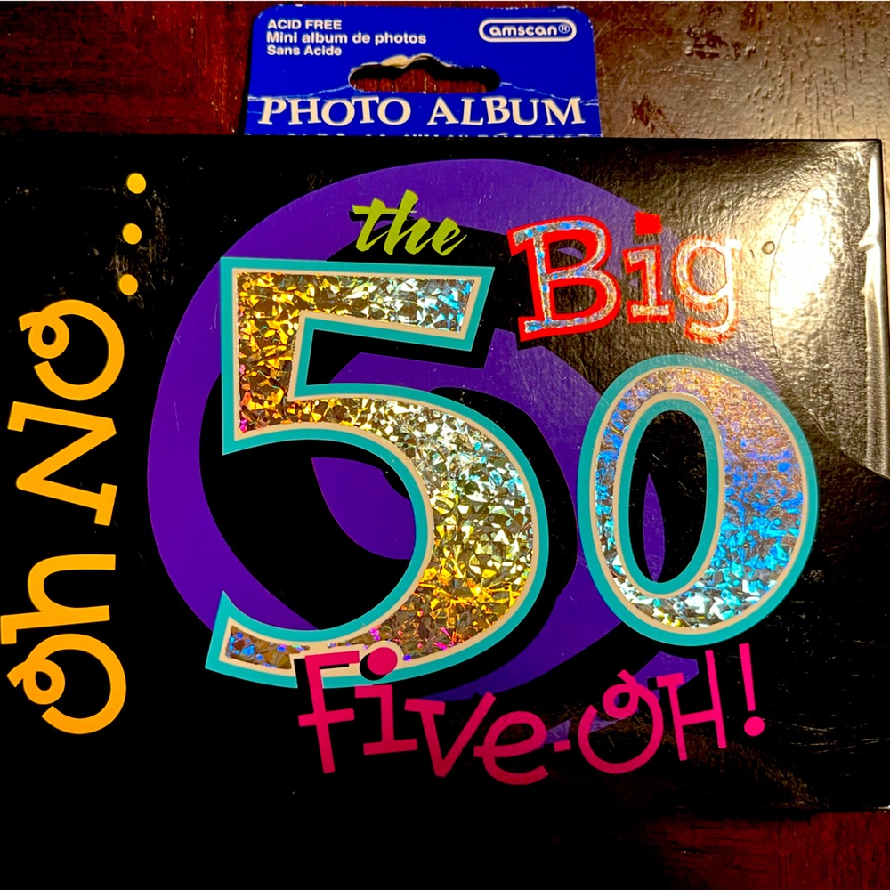 Photo album holds 36 4”X6” photos